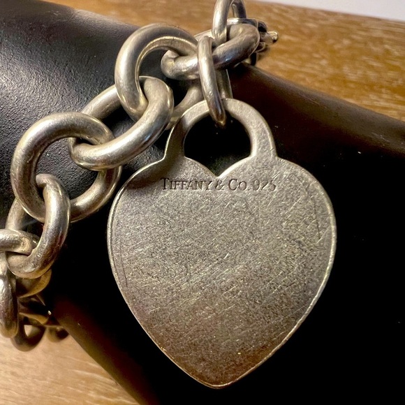 Tiffany and Co. 8” Sterling Silver Bracelet with a 1” Charm. - Picture 2 of 11